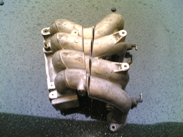 Three piece inlet manifold