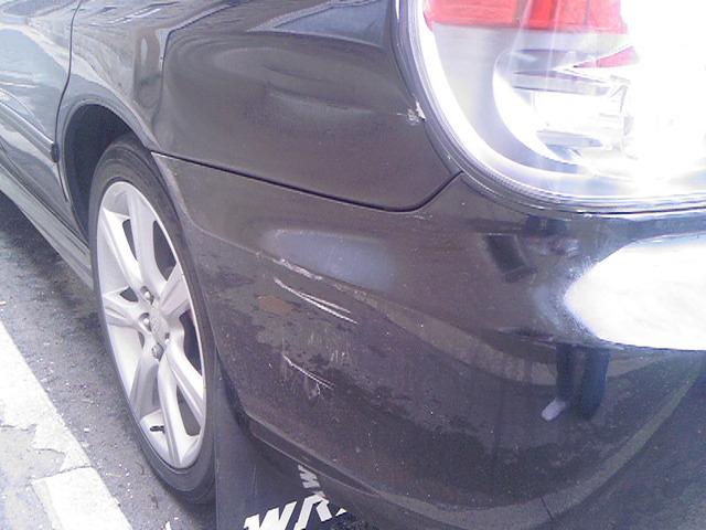 rear qtr damage