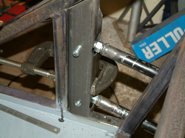 Rear suspension bracket inside chassis